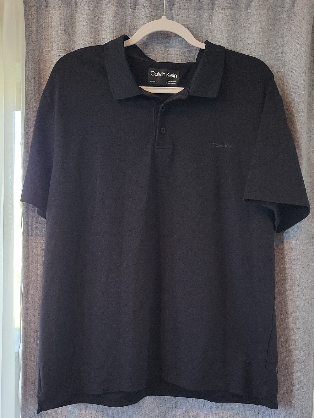 Calvin Klein Men’s Black Polo with Subtle Logo